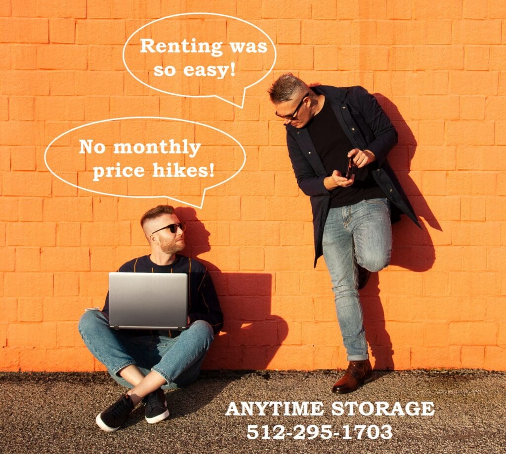 Two guys renting units using laptop and cell phones.